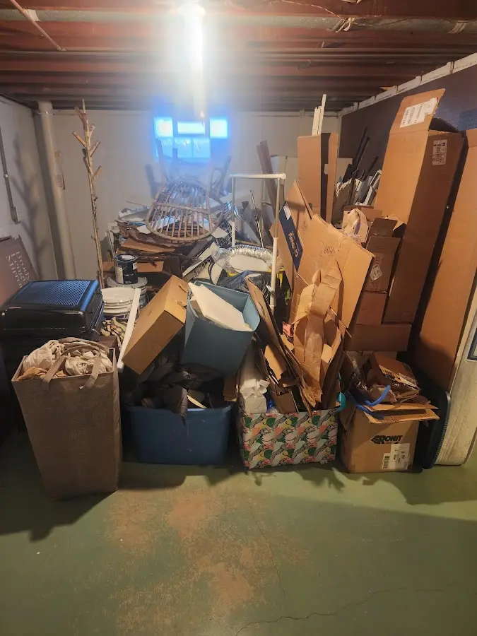 Roll-off dumpster container at job site for 6 Yard Dumpster Rental in Hartselle